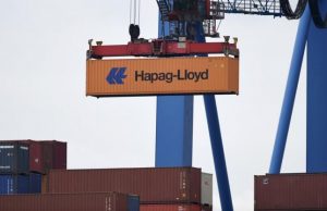 A Hapag Lloyd container is loaded on a ship at the shipping terminal Altenwerder in the harbour of Hamburg, Germany July 18, 2016. REUTERS/Fabian Bimmer